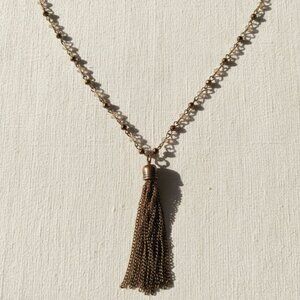 Gold Tassel Necklace with Dainty Design